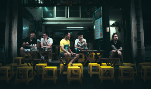 People hanging at a street bar in Hanoi